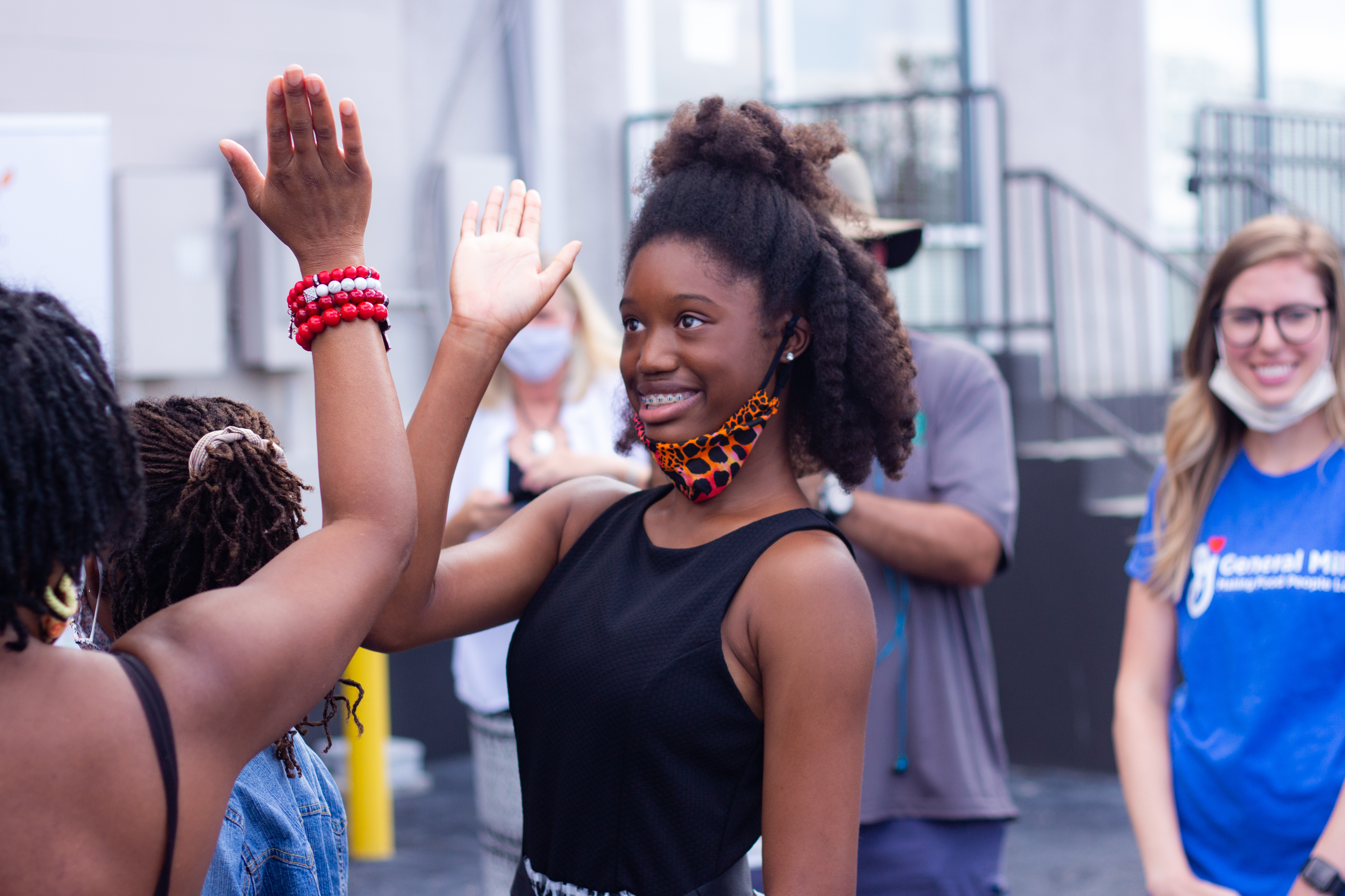 Kennedy McCormick giving a high five