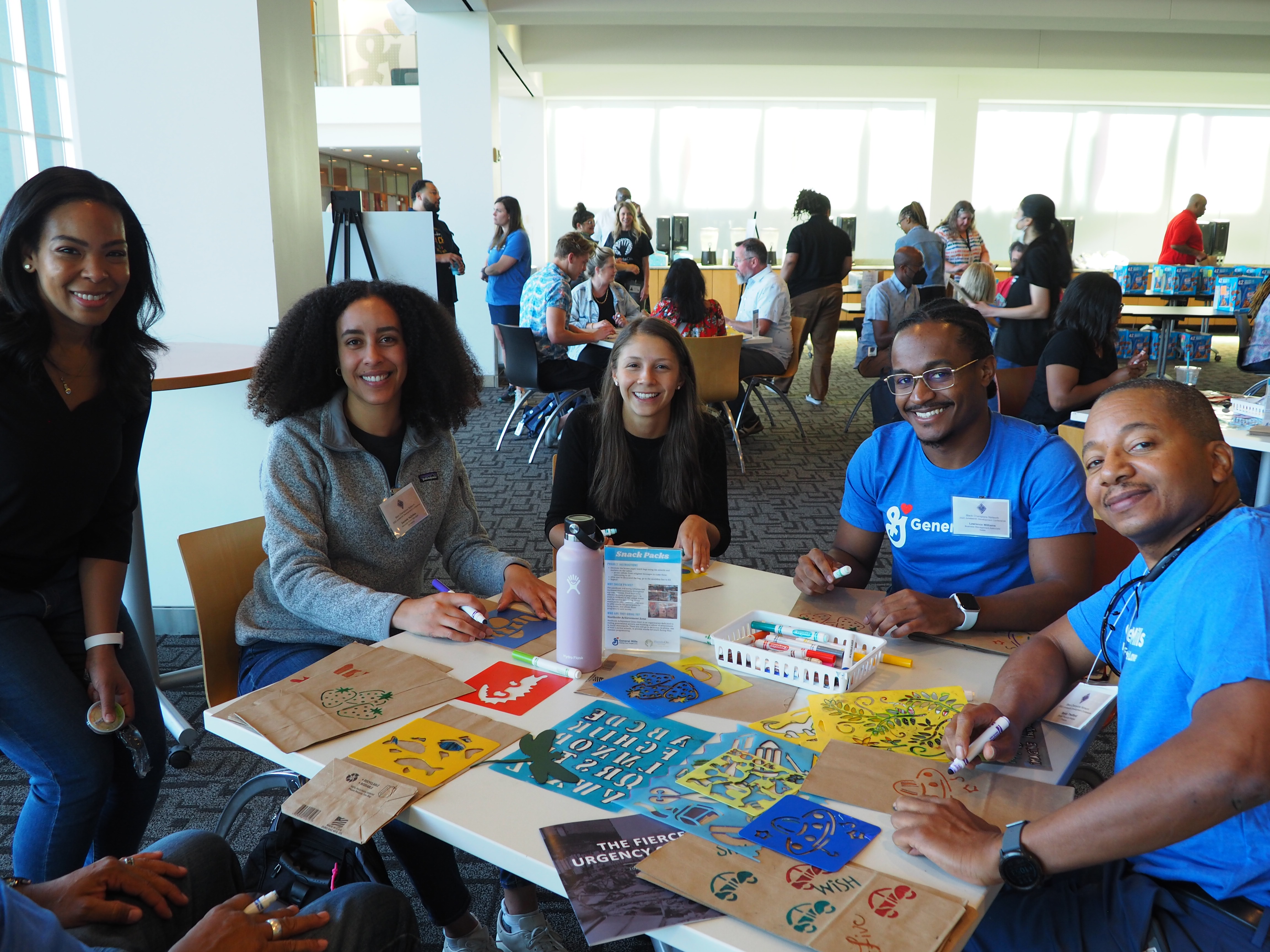 Employees volunteering at Juneteenth event