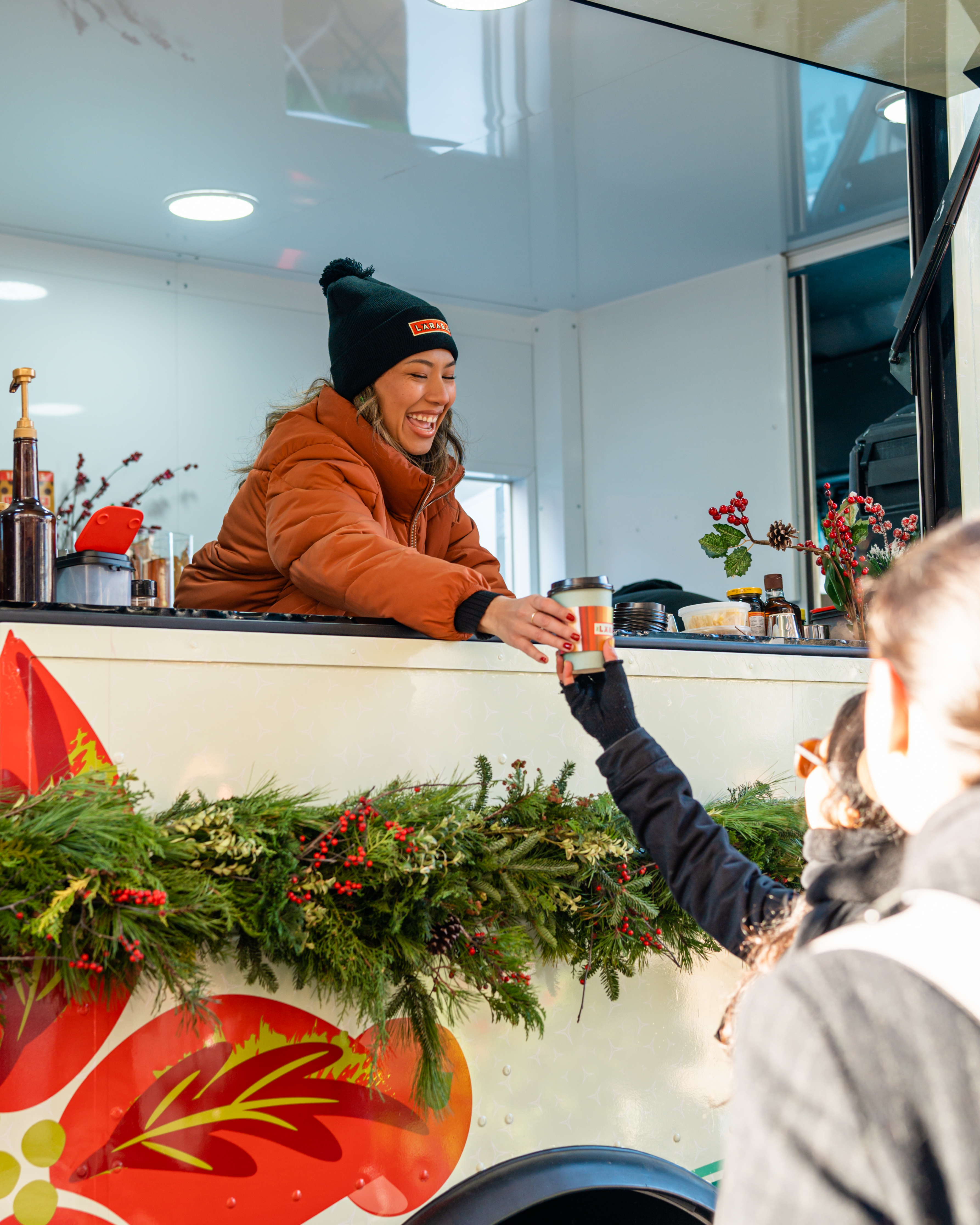 Asia handing out coffee