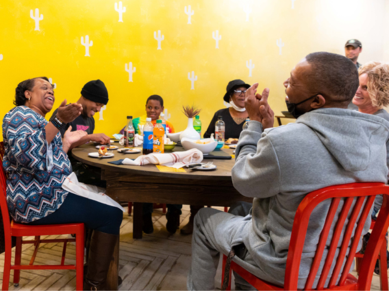 Family eating together at The Taco Shop by OEP