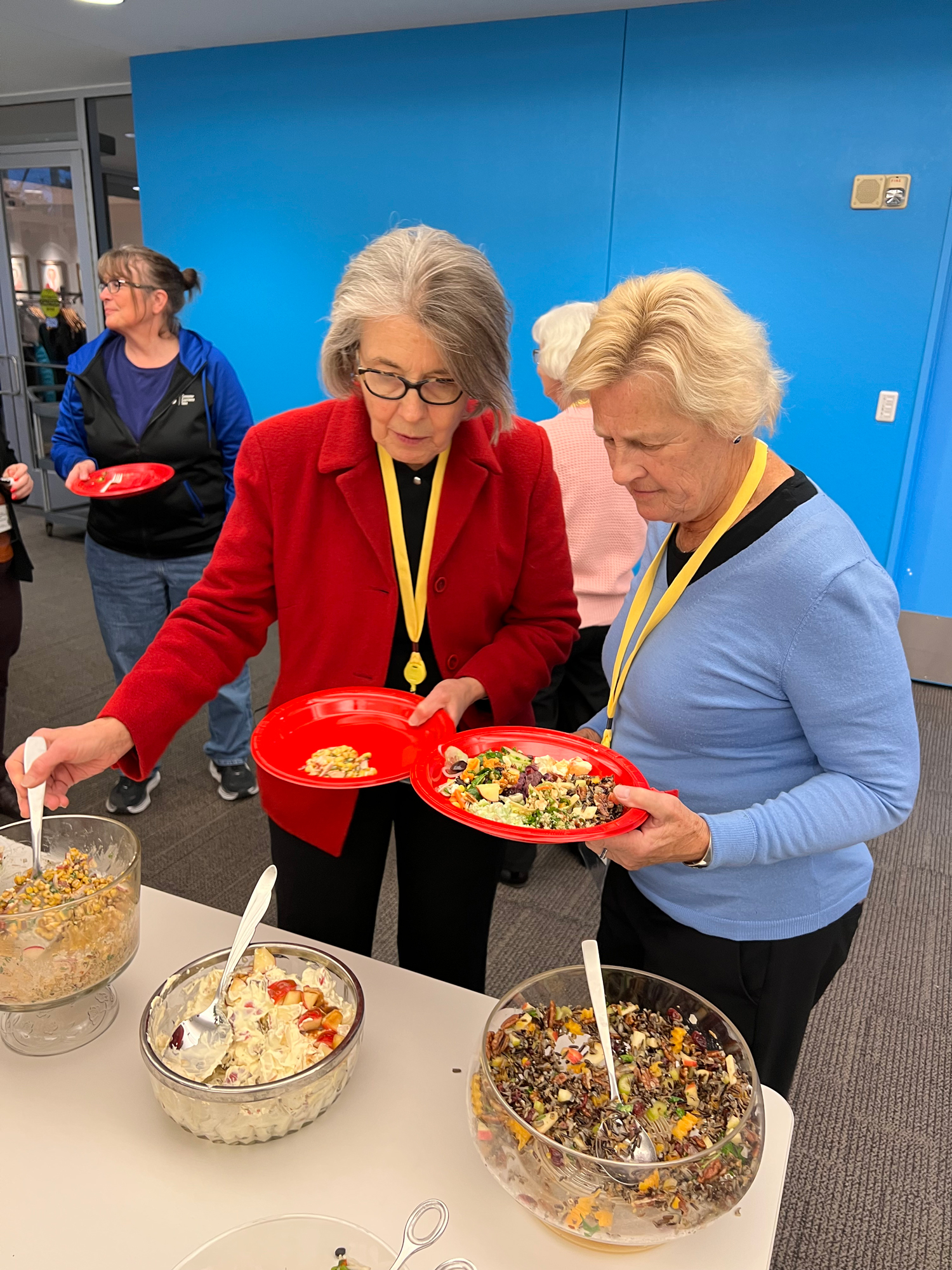Mary Bartz filling her plate at the reunion 