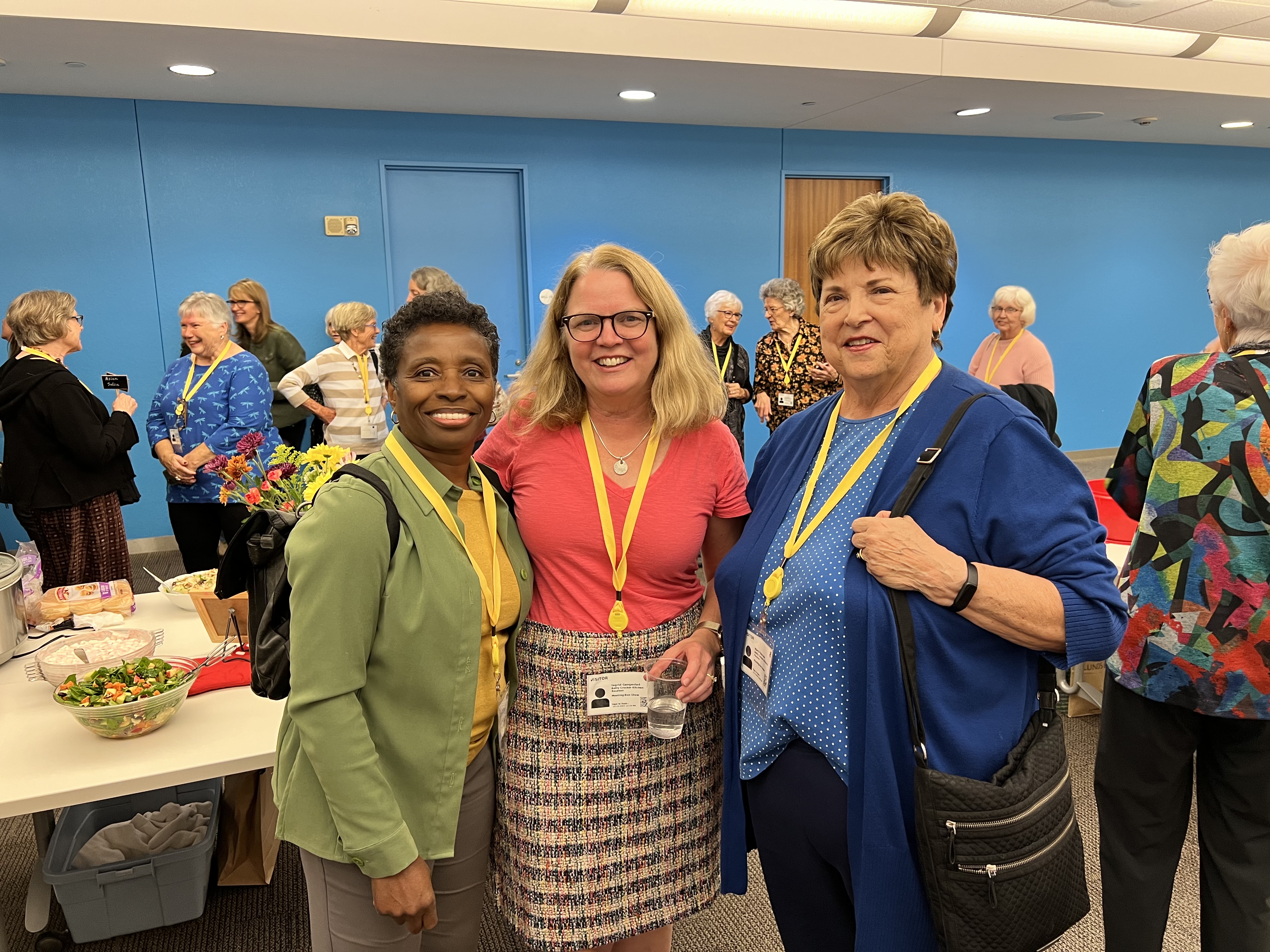 3 women posing for a photo in the Betty Crocker Kitchens 